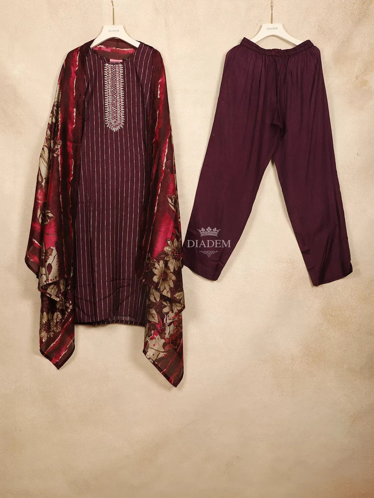 Burgundy Straight Cut Salwar Suit Adorned with Sequins and Stripes Design Paired with Dupatta